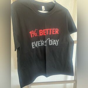Black graphic tee, 1% better every day